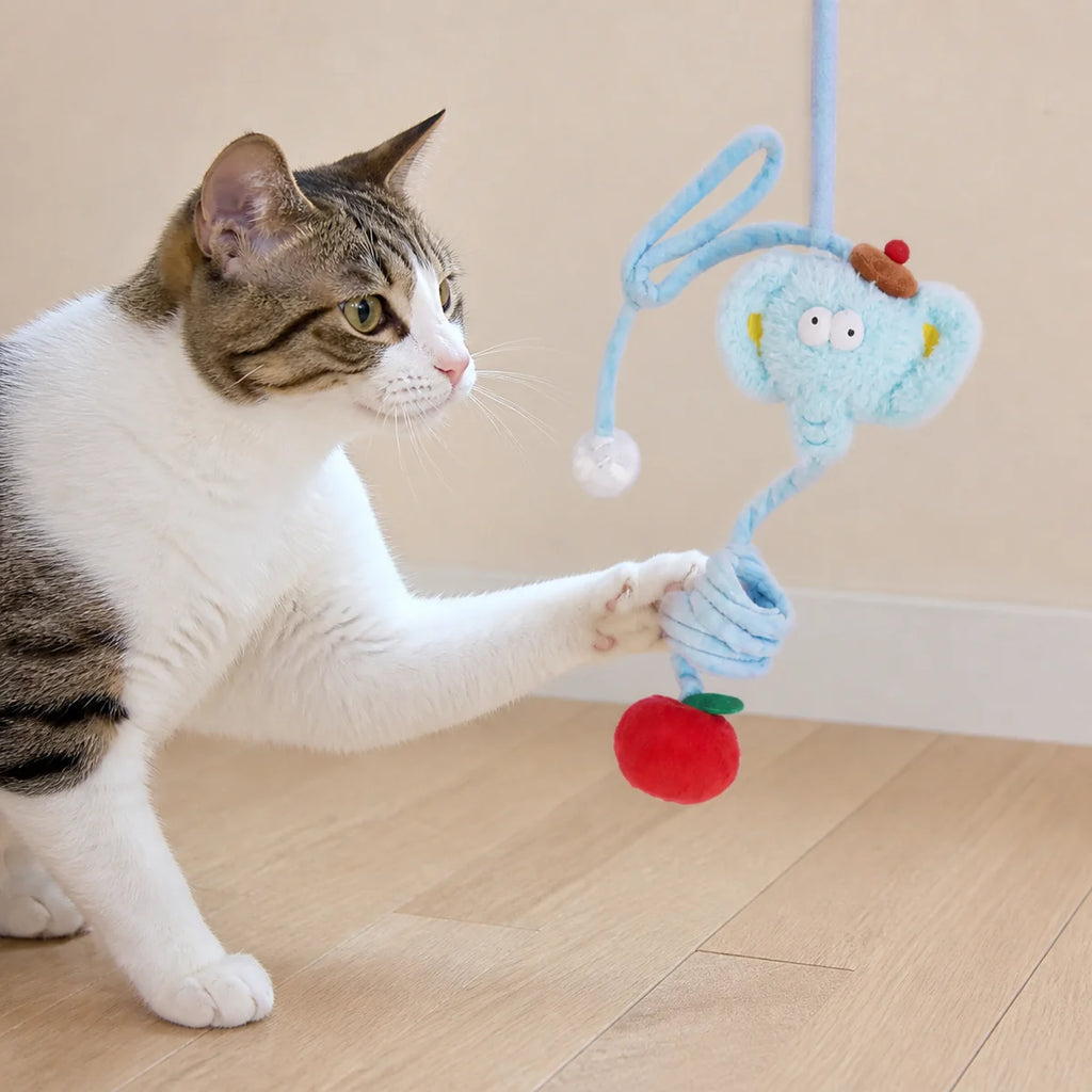 Bungee Elephant Hanging Cat Toy in a bright pet-home setting